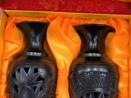 Black pottery vase set displayed in a modern interior with elegant oriental home decor style